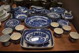 A good selection of blue and white willow wear dinner and tea wears including Royal Tudor wear