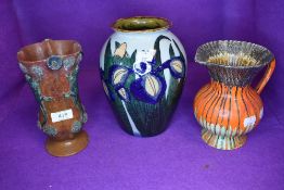 Three pieces of arts and crafts style pottery including newt or lizard decorated and similar Adams