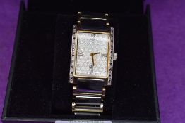 A gent's dress wrist watch by Tungsten noTU0074DM having decorative rectangular face with a black