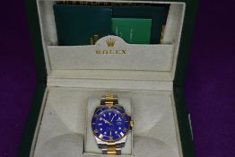 A gent's fashion wrist watch having blue face bearing name Rolex