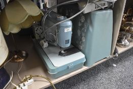 A vintage Jones model C sewing machine.