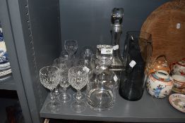 A selection of glass, including cut glass, decanters and a jug.