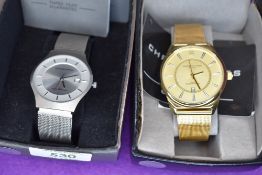 A gents gold plated fashion wrist watch by Christin Lars and a similar steel coloured wrist watch by