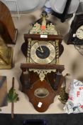A reproduction 8 day wall clock weight driven
