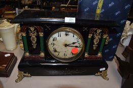 An American 8 day Marble effect mantel clock