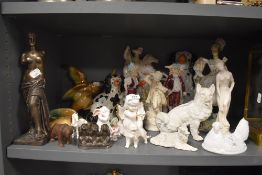 A selection of various figures including bisque Staffordshire flatback and wall mounted ducks
