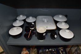 A selection of black and white kitchen wares including Denby soup dishes