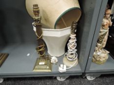A brass cast table lamp having a Greek column stem and a similar agate turned lamp base