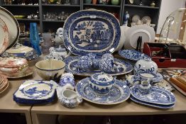 A good selection of various blue and white ware ceramics and porcelain including carpet bowls and