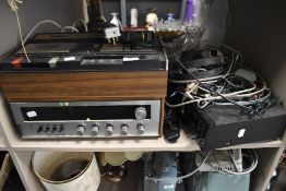 An Akai CS-33D cassette player a Rotel receiver and Pioneer CD player