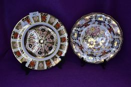 Two ceramic display plates by Royal Crown Derby in Imari designs