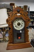 An Ansonia Clock Co, America 8 day gingerbreaad clock