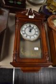 An Emperor Quartz wall clock