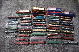 A collection of Bachmann, Hornby, Mainline and similar 00 gauge carriages, with empty boxes approx