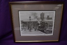 A framed print after J S Gibb, Ulverston Station, bearing signature, 35cm x 42cm including frame