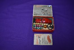 A Schuco Telesteering Car 3000 in red with accessories and instructions present, in original box