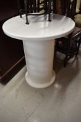 A modernist occasional table, cotton reel style, diameter approx. 60cm