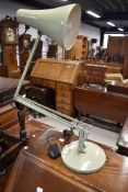 A vintage angle poise lamp in the Herbert Terry style, olive green