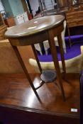A low side or plant table with circular design
