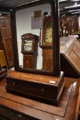 A 19th Century mahogany toilet mirror having gilt detailing on drawer base with bracket feet,