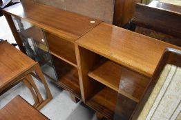 A pair of vintage glazed door bookcases, in the Herbert Ellis style