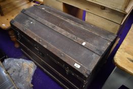 A dome top travel trunk or bedding box