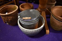 A selection of plant pots and zinc buckets