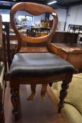 A Victorian mahogany balloon back dining chair