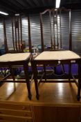 A pair of Edwardian mahogany salon or bedroom chairs