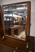 A 19th Century toilet mirror having mahogany frame, height approx. 69cm