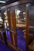 A Victorian mirror door wardrobe