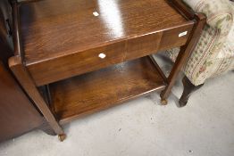 A traditional oak tea trolley