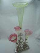 A Victorian silver plated table centre epergne having central vaseline glass trumpet vase surrounded