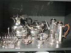 A selection of silver plate including four piece tea set, coffee pot, toast rack, mustard pot etc