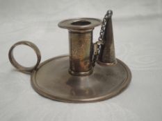 A Georgian silver chamber stick of small plain form having ring handle, detachable sconce and