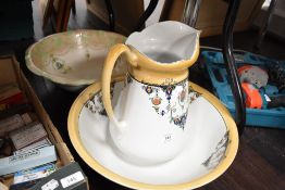 A wash jug and bowl set by Ibsons and similar bowl