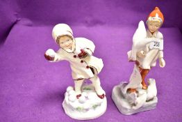 Two Royal Worcester figures having black back stamp November and December