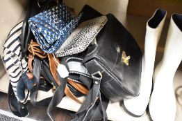 A selection of hand and clutch bags also a pair of wellies