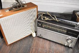 A Coumber Worcester F10 speaker cabinet and a Grundig Yacht boy radio set