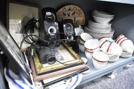 A selection of tea cups and saucers un named having burgundy and gilt detail A pair of computer