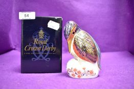 A ceramic Royal Crown Derby paper weight or figure of a Kingfisher having gold stopper and box