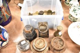 A selection of various brass and cast kitchen balance scale weights