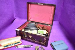 A Victorian rose wood case with mother of pearl inlay with contents