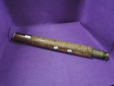 A scientific telescope having brass body with leather grip stamped with anchor and Try Me