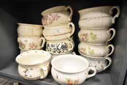 A large selection of antique and later ceramic chamber pots