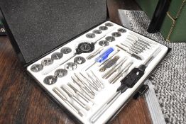 A mechanics or engineers Auto Jack tap and dye set