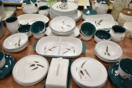 A selection of tea and dinner wares by Denby in the Greenwheat design