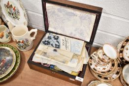 An inlaid antique mahogany case with needlework and haberdashery items