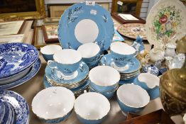 A part tea service by Colclough in a blue and gilt glaze