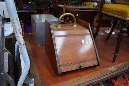 A Victorian mahogany coal purdonium , complete with shovel and liner